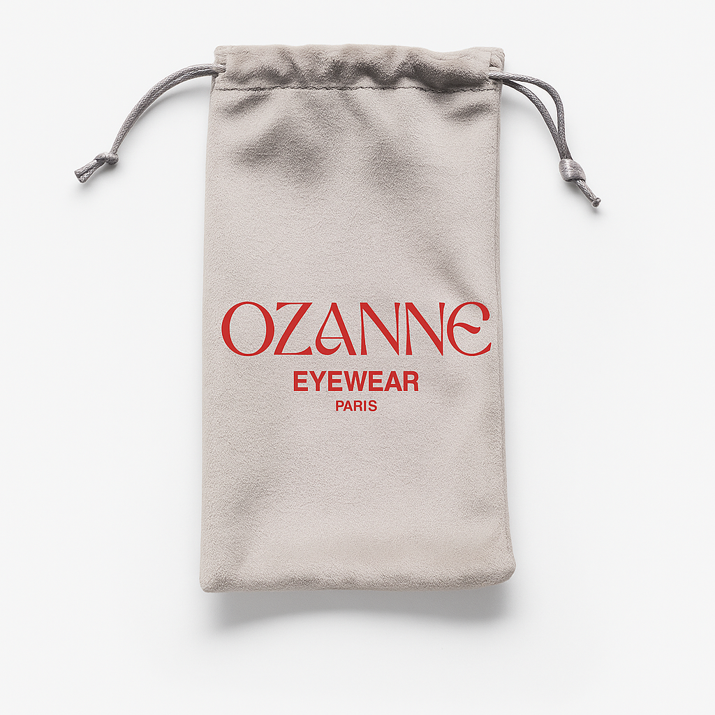 A gray drawstring bag with the text "OZANNE EYEWEAR PARIS" printed on it in red.