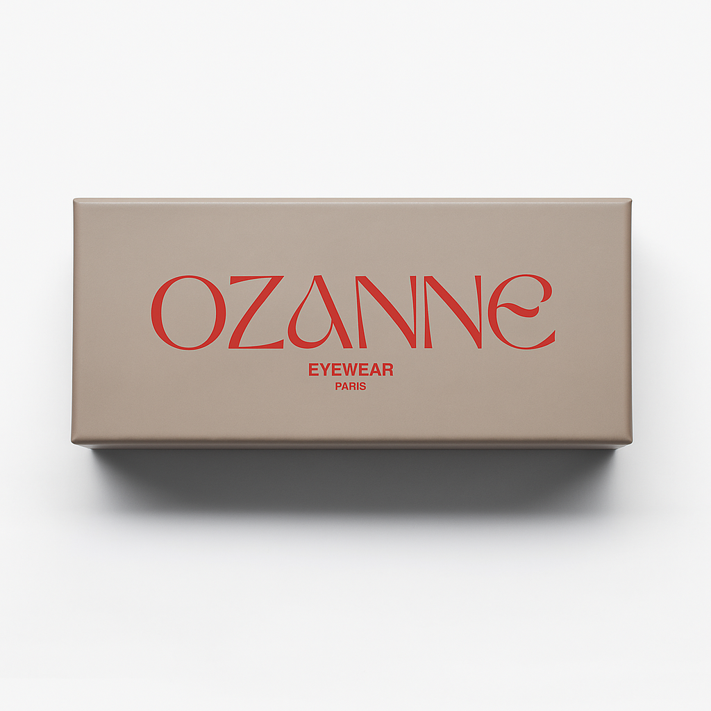 A beige box with the text "OZANNE EYEWEAR PARIS" printed on it in red.